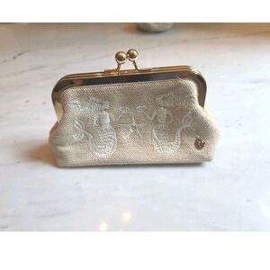 Elegant Cream Clutch with Gold Accents